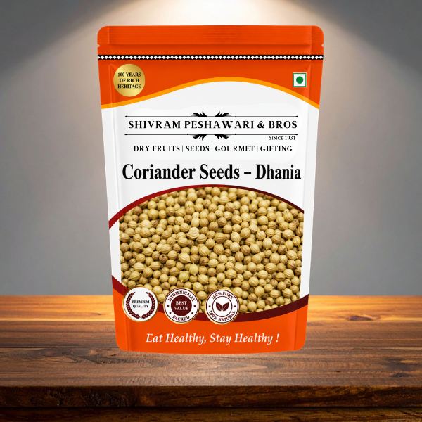 Shivram Peshawari & Bros Coriander Seeds Dhania standup pouch displayed on a wooden surface